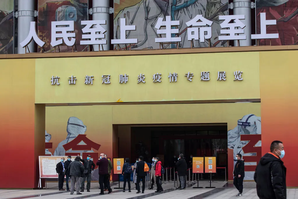 WHO-China joint study team visiting a Wuhan exhibition, February 2021